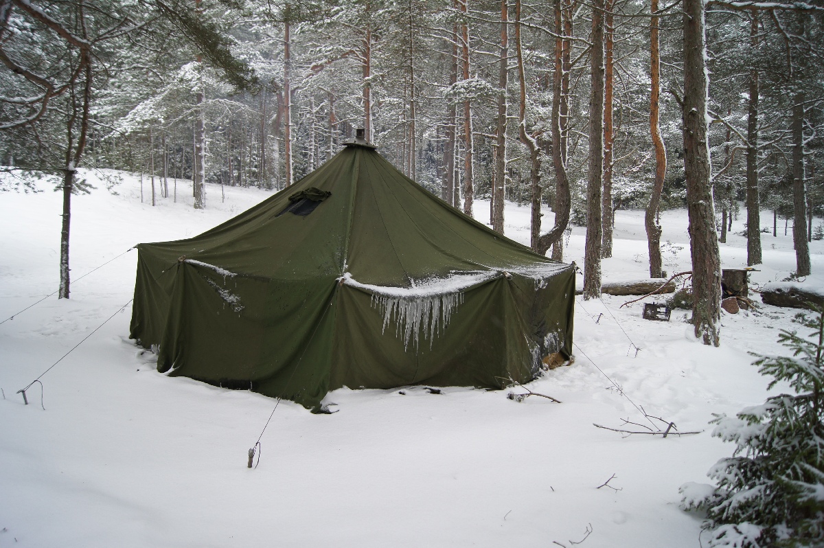 Icicle on the swedish army tent. Matsirand. Holiday in Estonia, Matsi beach on winter.